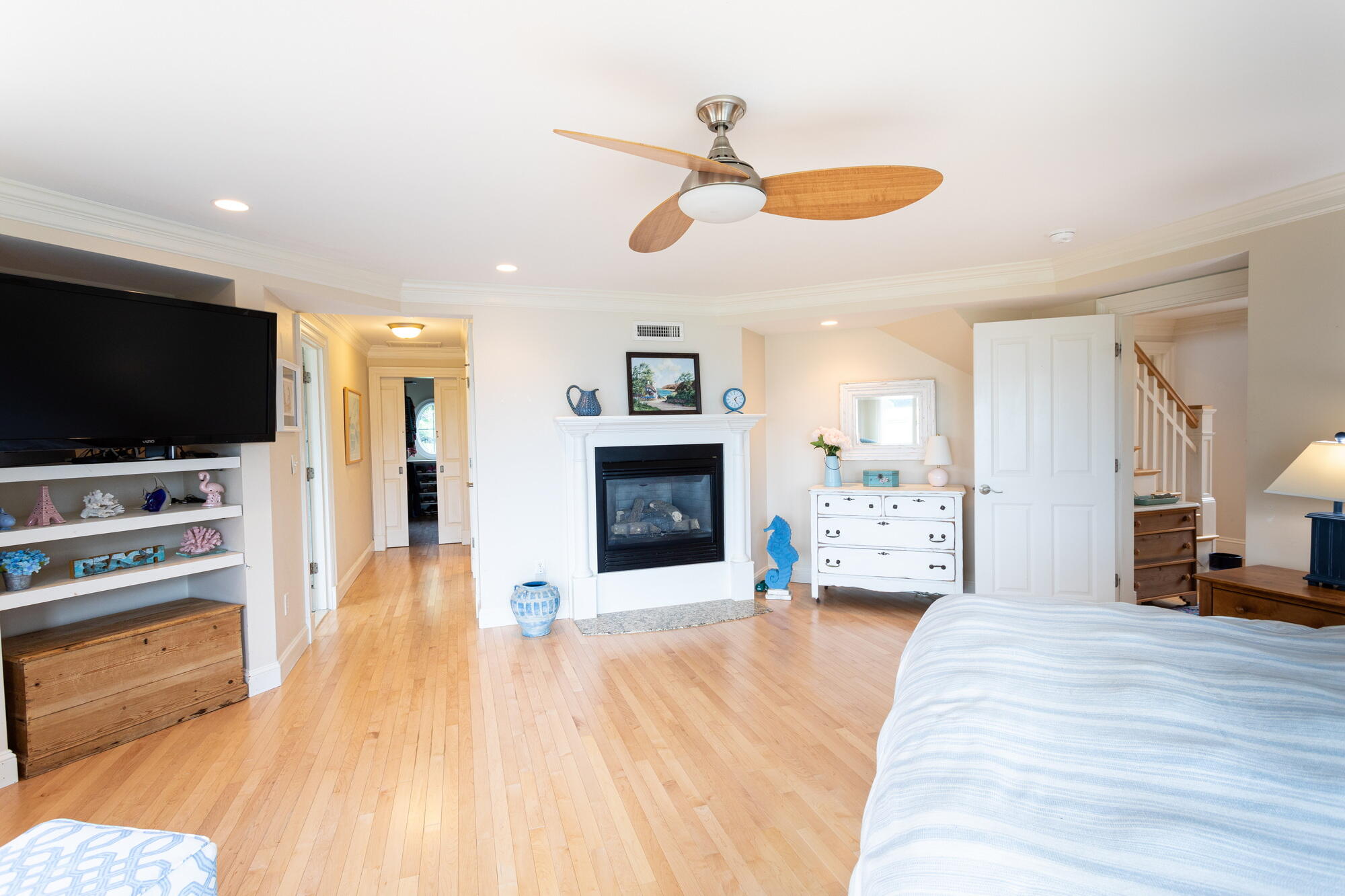 157 Monomoscoy Road Mashpee, MA 02649 - Photo 23 of 43 a living room with furniture and a flat screen tv