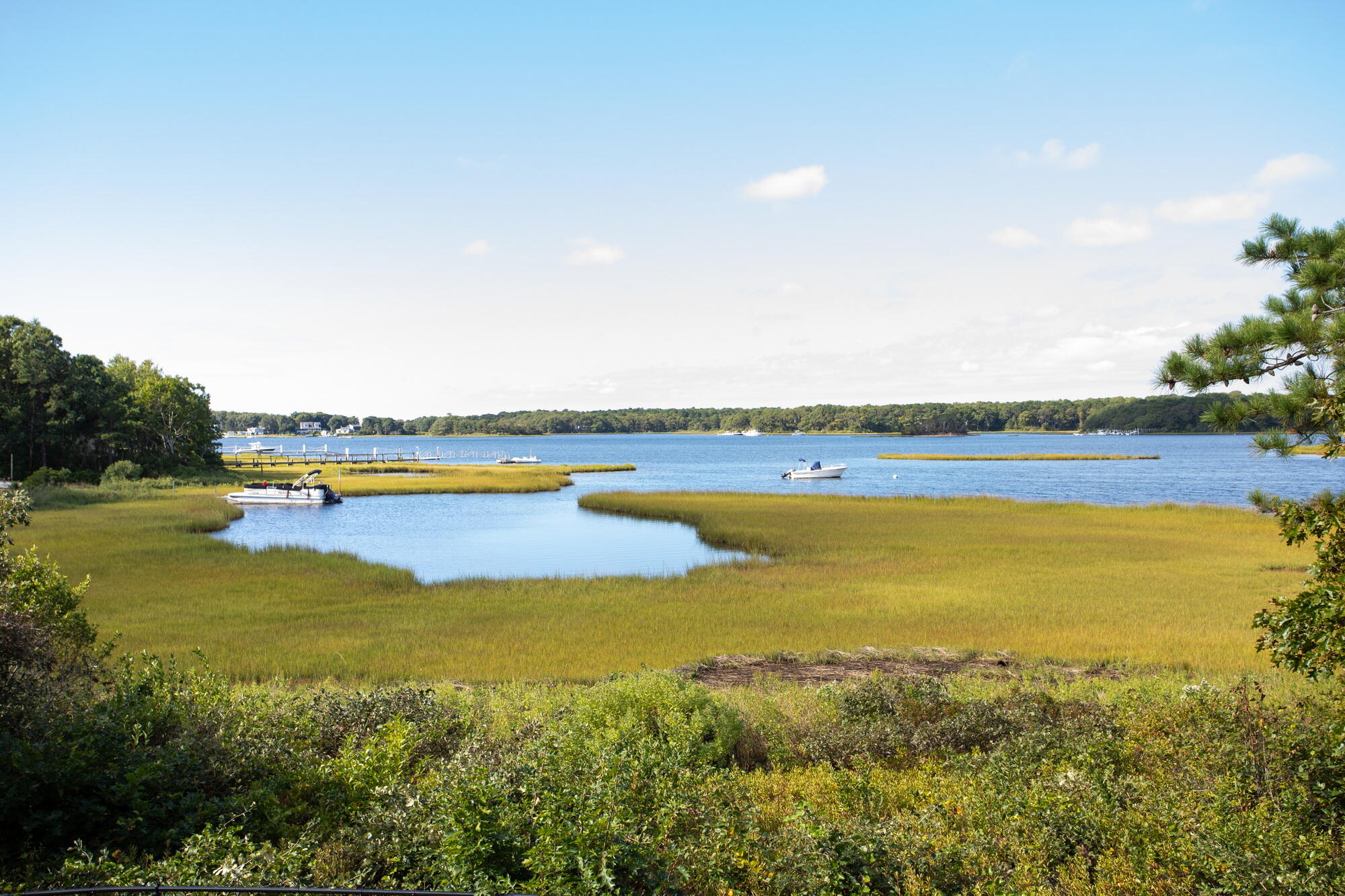 157 Monomoscoy Road Mashpee, MA 02649 - Photo 33 of 43 a view of an ocean and swimming pool