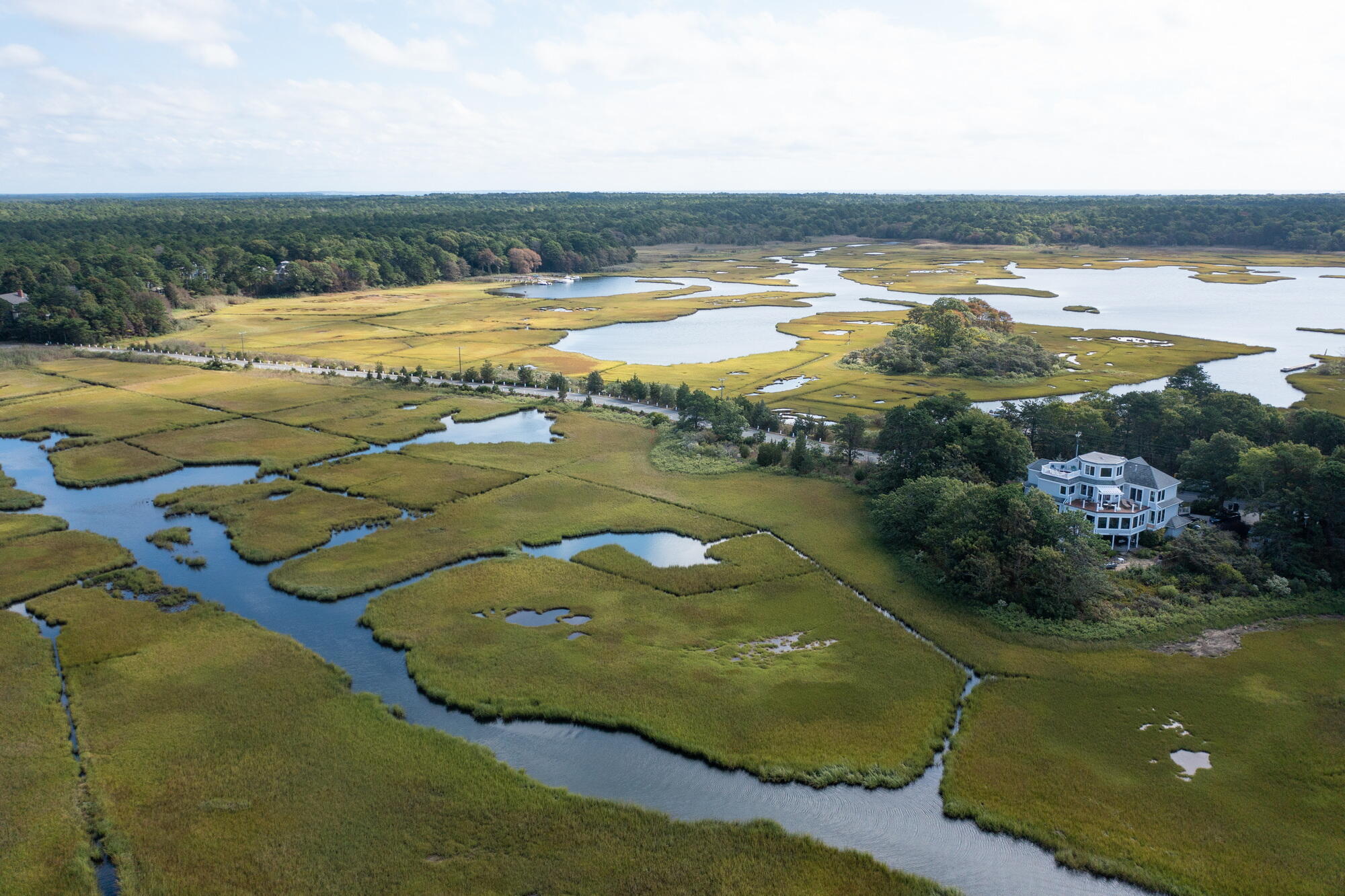157 Monomoscoy Road Mashpee, MA 02649 - Photo 39 of 43 a view of an ocean and beach