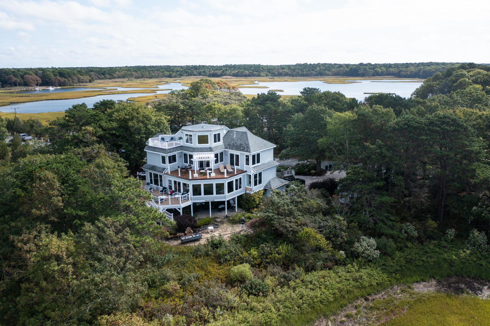 157 Monomoscoy Road Mashpee, MA 02649 - Photo 4 of 43 a view of a balcony with lake view and mountain view