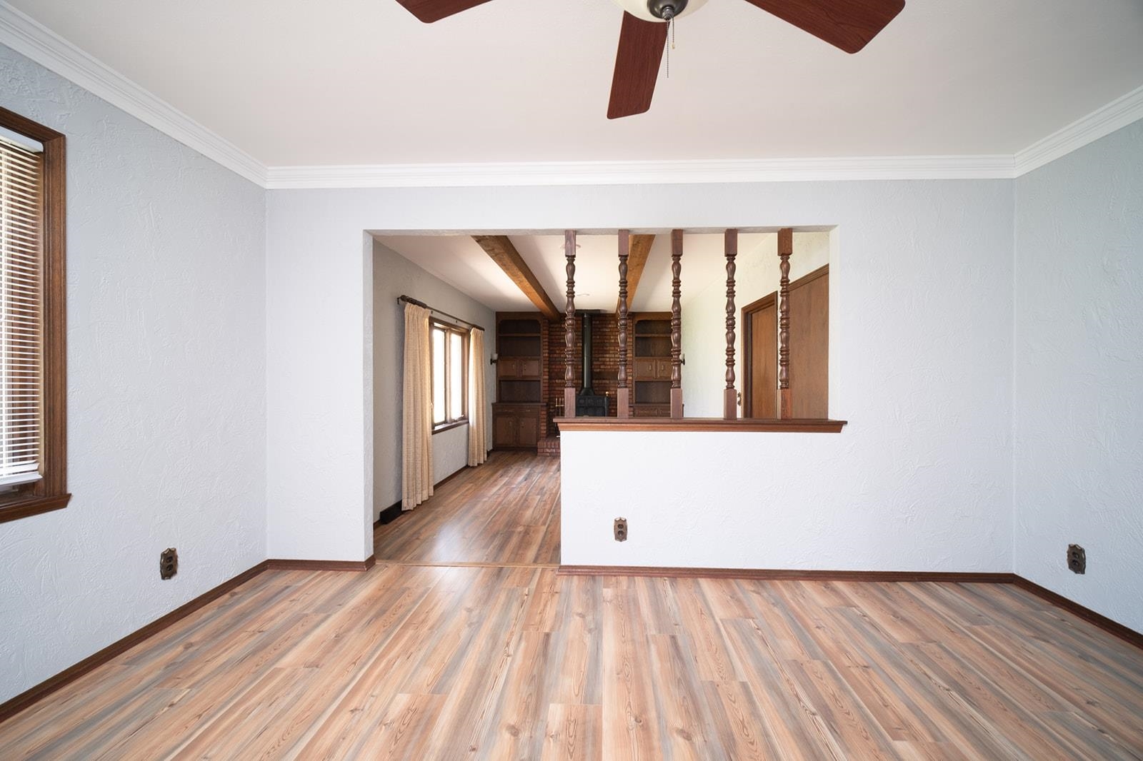 10401 Ray Drive Roscoe, IL 61073 - Photo 13 of 38 a view of an empty room with wooden floor and a window