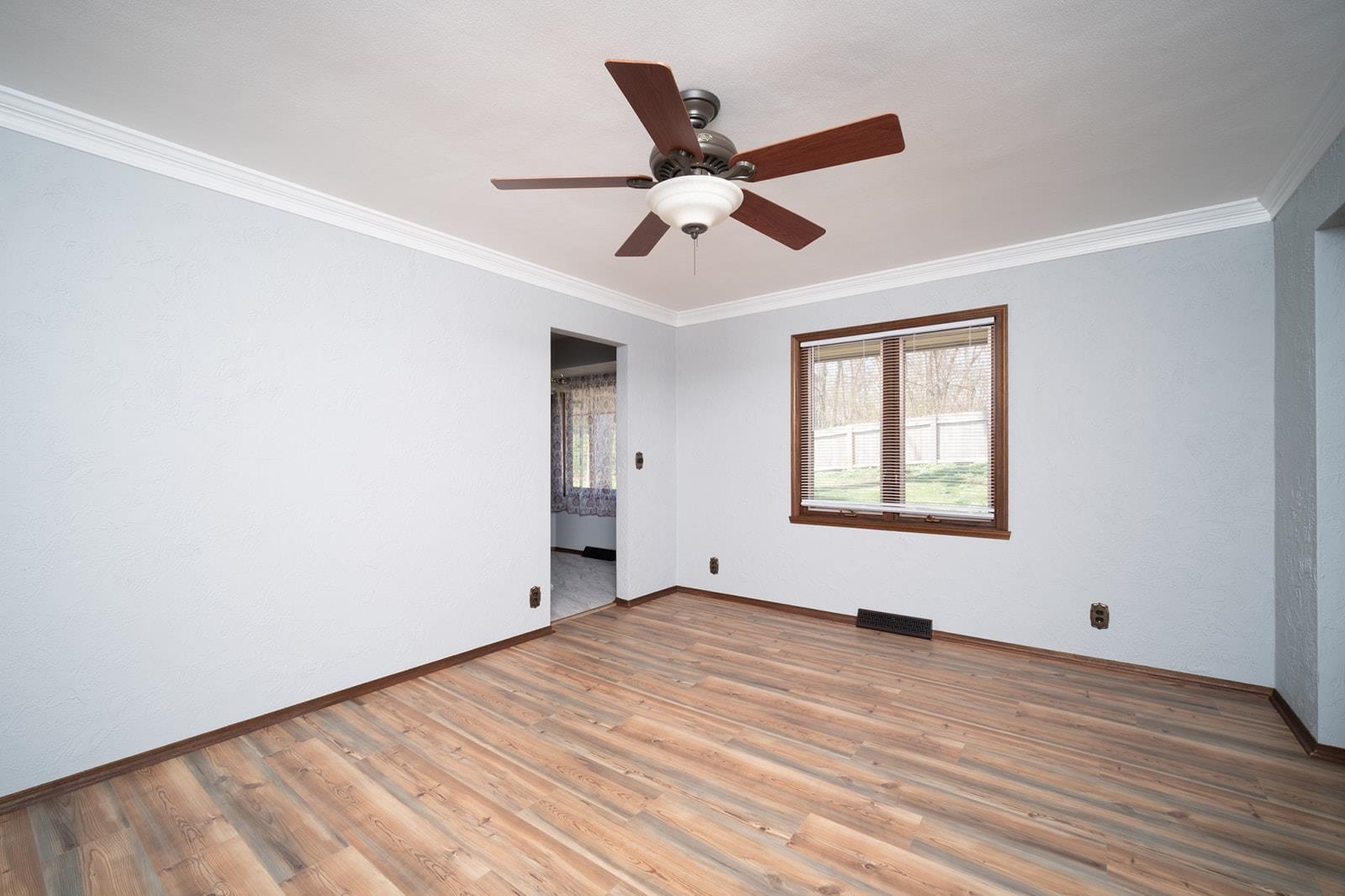 10401 Ray Drive Roscoe, IL 61073 - Photo 14 of 38 wooden floor in an empty room with a window