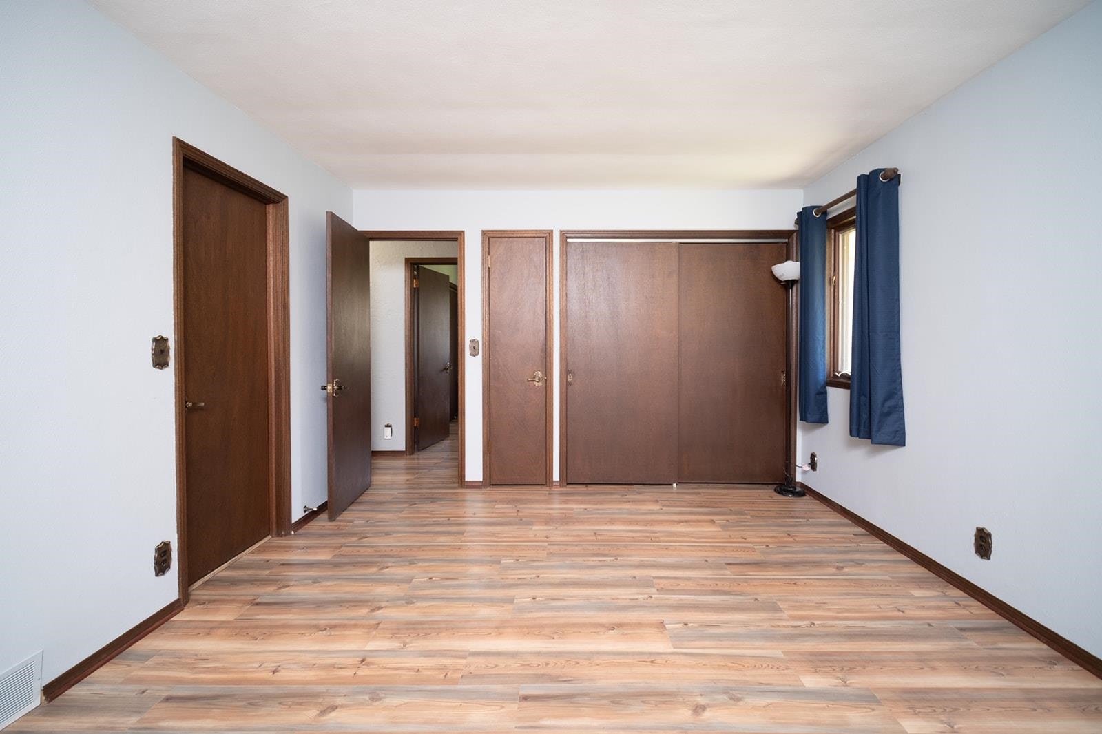 10401 Ray Drive Roscoe, IL 61073 - Photo 23 of 38 a view of an empty room with wooden floor