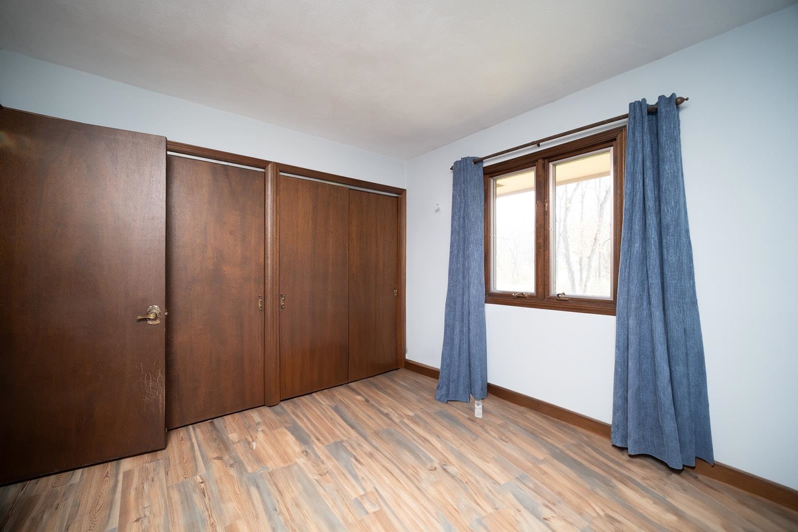 10401 Ray Drive Roscoe, IL 61073 - Photo 24 of 38 a view of empty room with wooden floor and fan