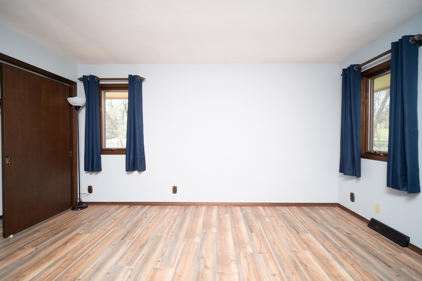 10401 Ray Drive Roscoe, IL 61073 - Photo 28 of 38 a view of an empty room with wooden floor and a window