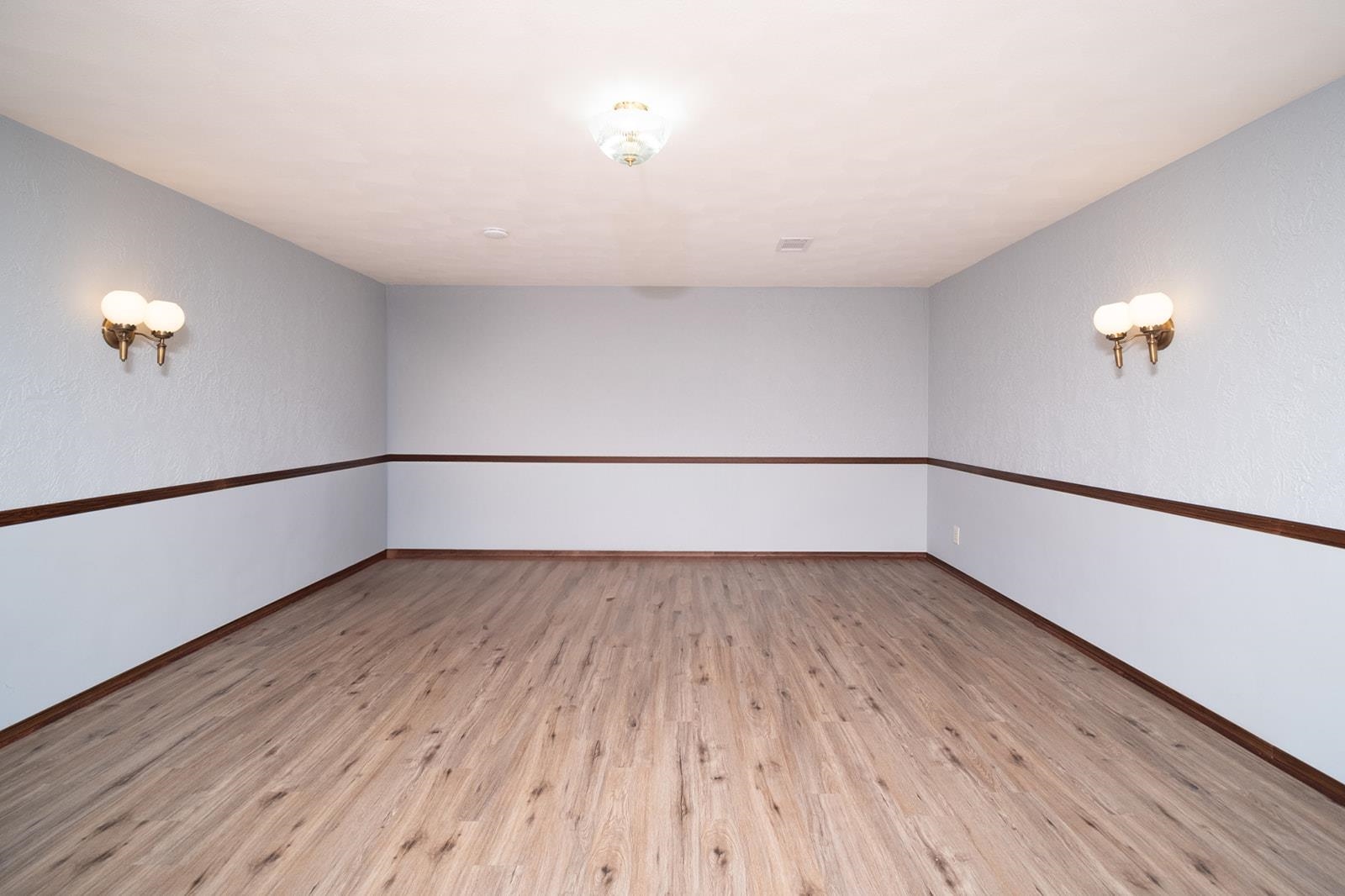 10401 Ray Drive Roscoe, IL 61073 - Photo 30 of 38 a view of an empty room with wooden floor and a window