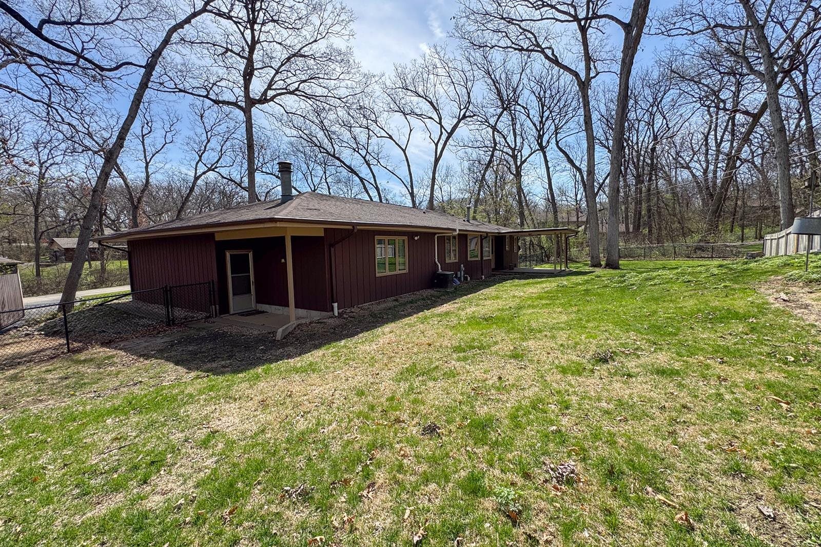 10401 Ray Drive Roscoe, IL 61073 - Photo 6 of 38 a view of a house with a yard