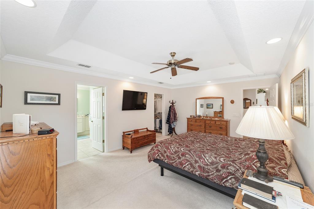 2320 Southeast 33rd Street Ocala, FL 34471 - Photo 28 of 67 a living room with furniture and a flat screen tv