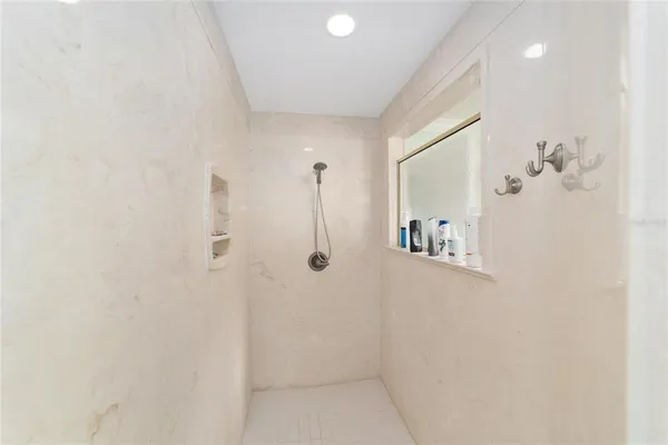 a room with a sink and cabinets