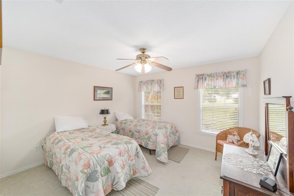 2320 Southeast 33rd Street Ocala, FL 34471 - Photo 37 of 67 a bed room with two bed and a window