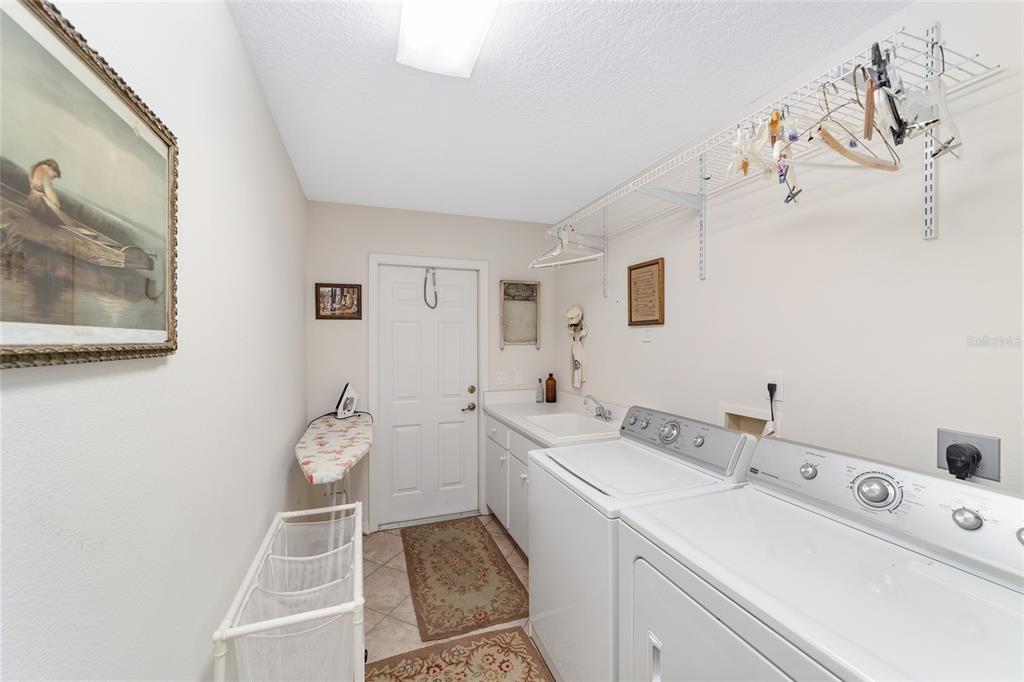 2320 Southeast 33rd Street Ocala, FL 34471 - Photo 41 of 67 a room with a sink and cabinets