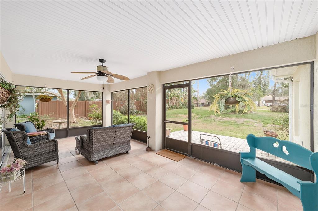 2320 Southeast 33rd Street Ocala, FL 34471 - Photo 43 of 67 a living room with furniture and floor to ceiling windows