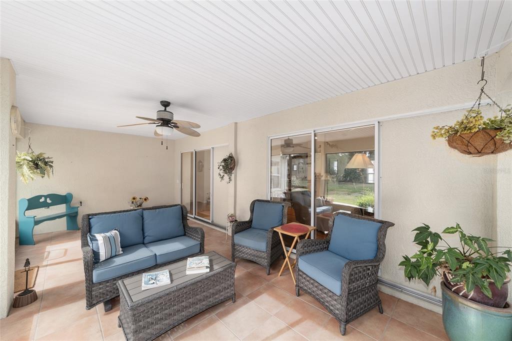 2320 Southeast 33rd Street Ocala, FL 34471 - Photo 45 of 67 a living room with furniture and a potted plant
