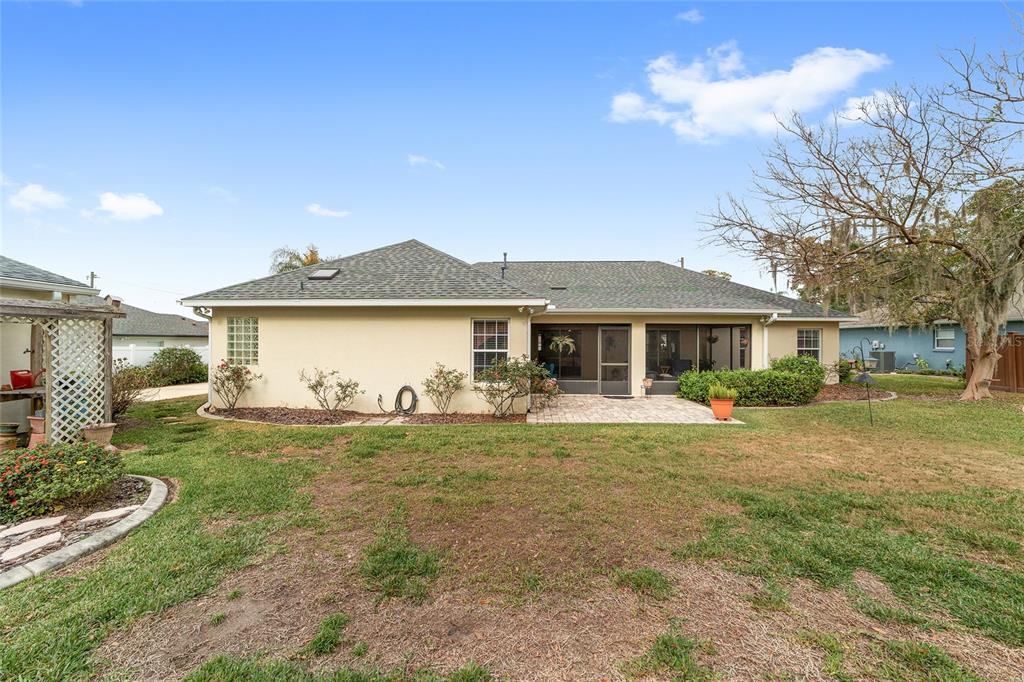 2320 Southeast 33rd Street Ocala, FL 34471 - Photo 49 of 67 a front view of a house with garden