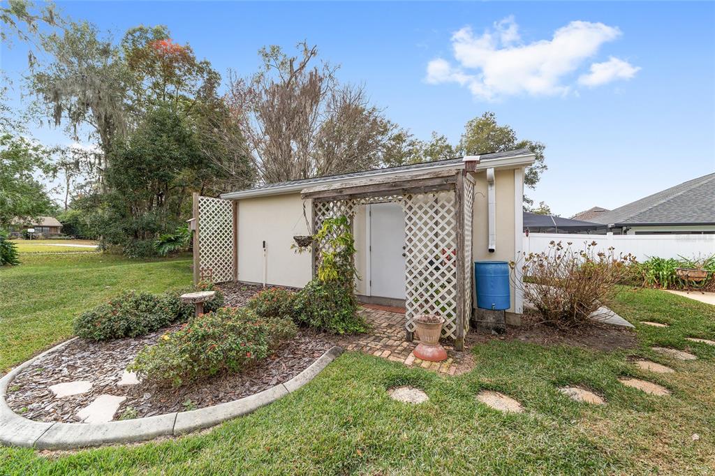 2320 Southeast 33rd Street Ocala, FL 34471 - Photo 52 of 67 a view of a backyard with pathway