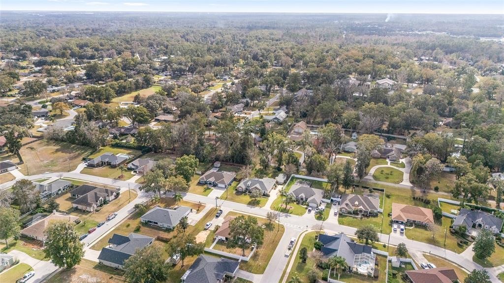 2320 Southeast 33rd Street Ocala, FL 34471 - Photo 60 of 67 an aerial view of residential house with parking space