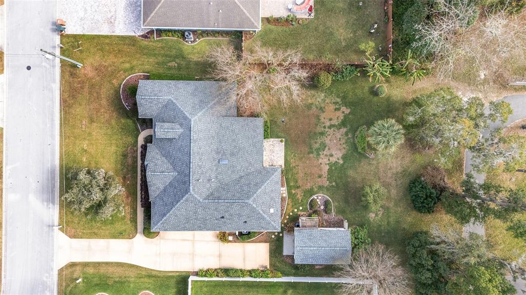 2320 Southeast 33rd Street Ocala, FL 34471 - Photo 61 of 67 an aerial view of a house with a yard and large tree