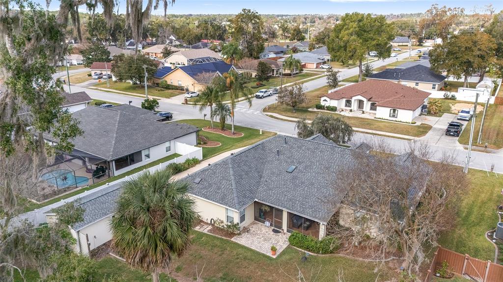 2320 Southeast 33rd Street Ocala, FL 34471 - Photo 64 of 67 an aerial view of a house with a yard basket ball court and outdoor seating