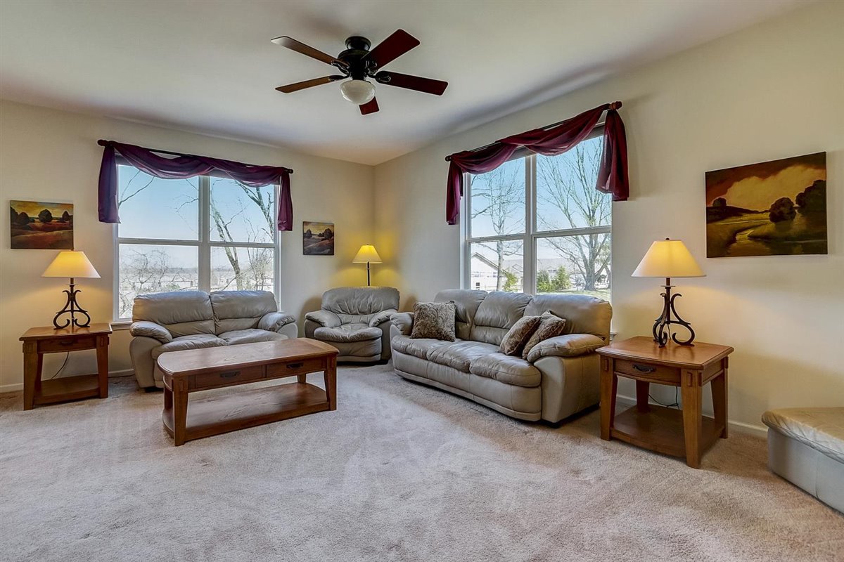 231 Ridge Road North Aurora, IL 60542 - Photo 3 of 31 a living room with furniture and a window