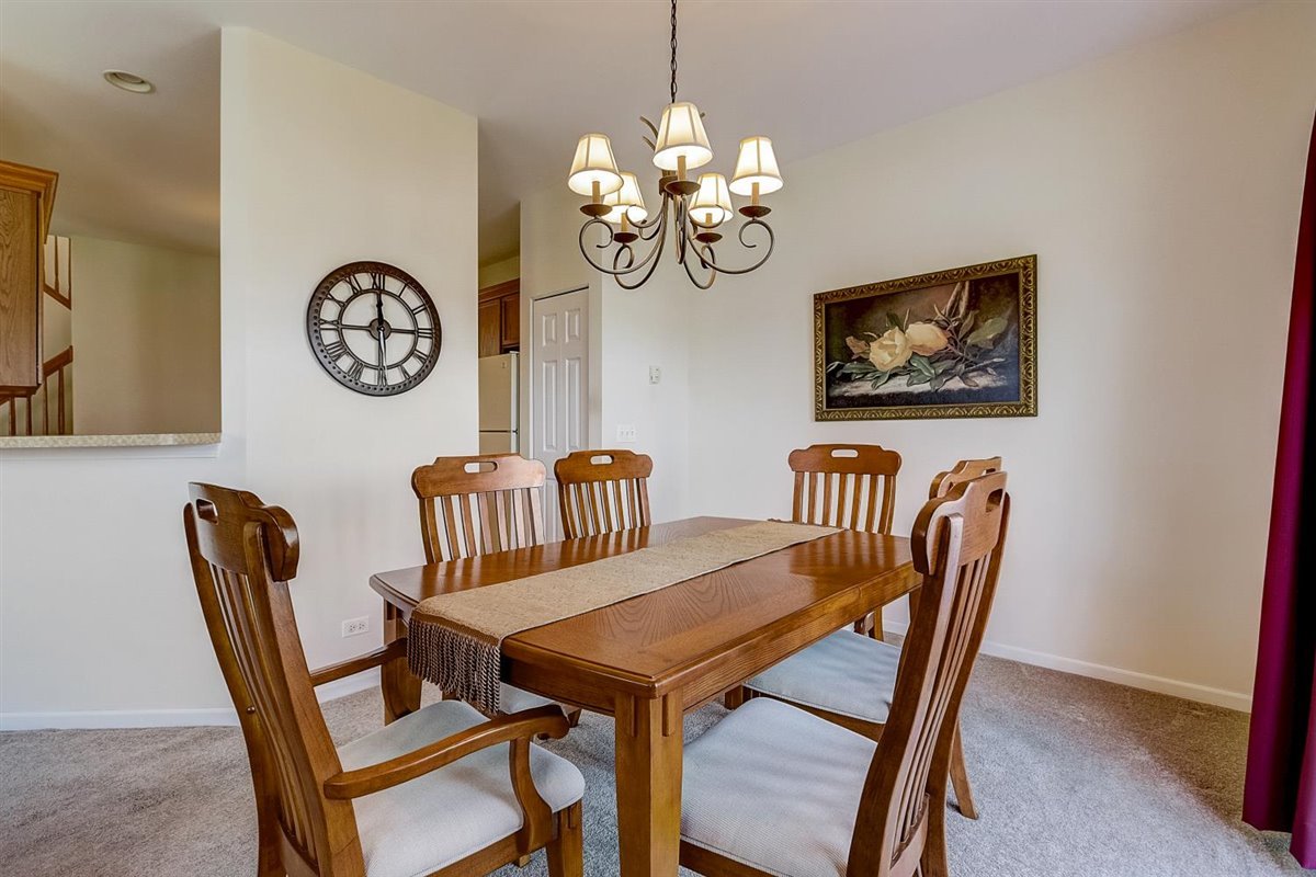 231 Ridge Road North Aurora, IL 60542 - Photo 6 of 31 a view of a dining room with furniture