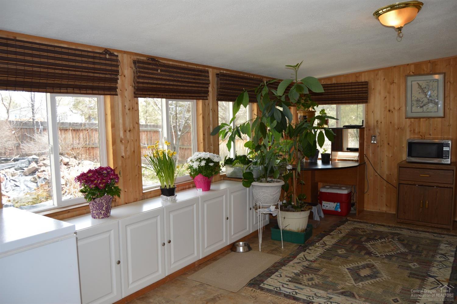 8280 Southwest Crater Loop Road Terrebonne, OR 97760 - Photo 7 of 25 This is the sunroom. This room is self
