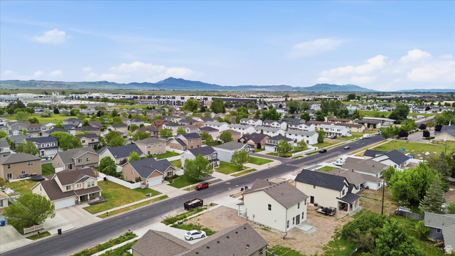 844 North 400 West Logan, UT 84321 - Photo 38 of 43 Aerial perspective of a residential neighborhood featuring single-family homes with pitched roofs