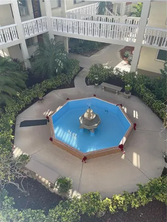 a view of a patio with a table and chair