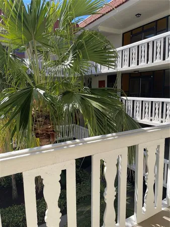 a view of houses with a street