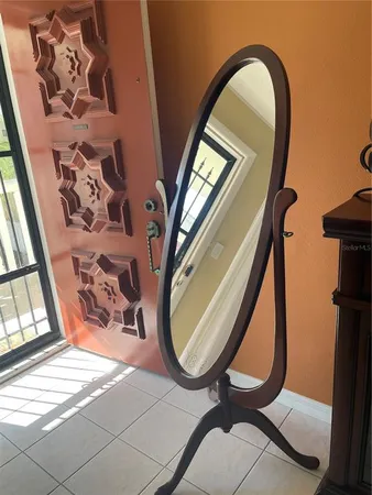 a view of a entryway with a mirror