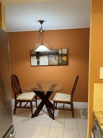 a workspace room with a chair and a table