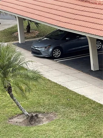 a car parked in front of a house