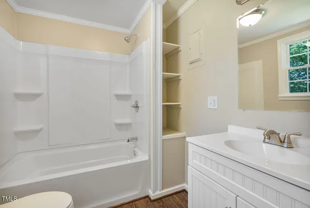 a bathroom with a bathtub and a sink