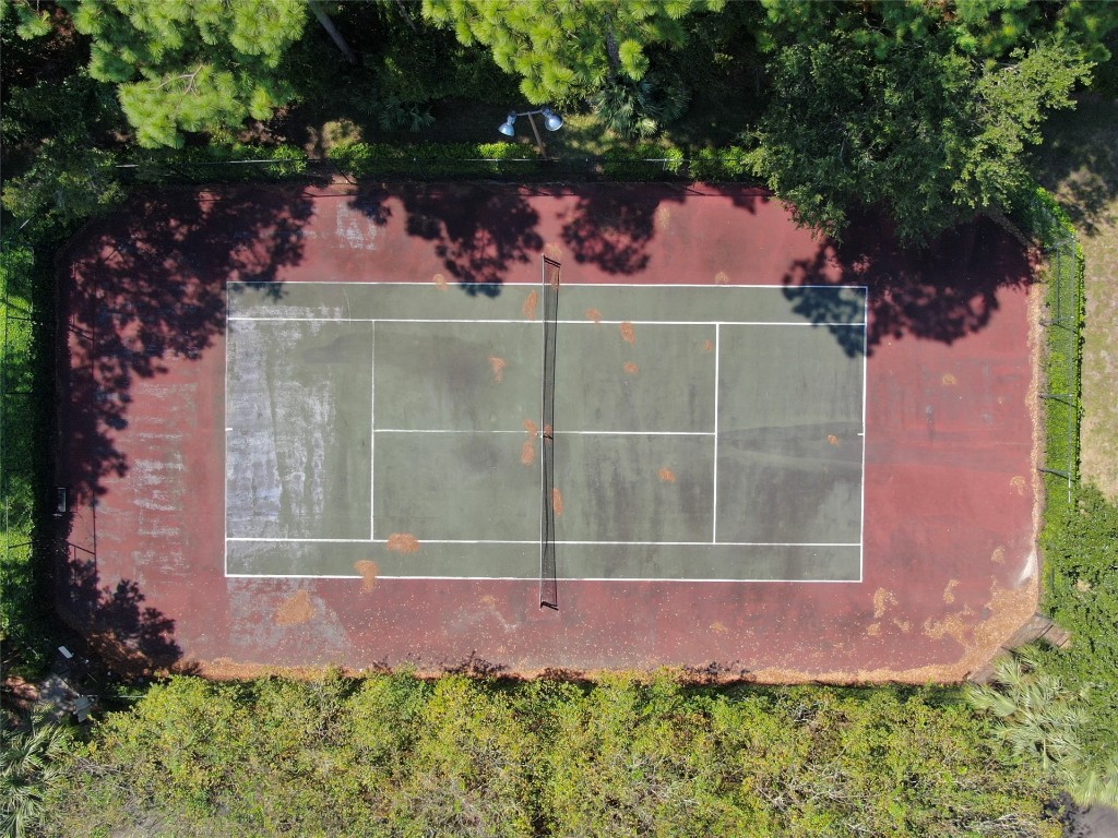 31183 Paradise Cmns, Unit 713 Fernandina Beach, FL 32034 - Photo 29 of 35 a front view of a house with a garden