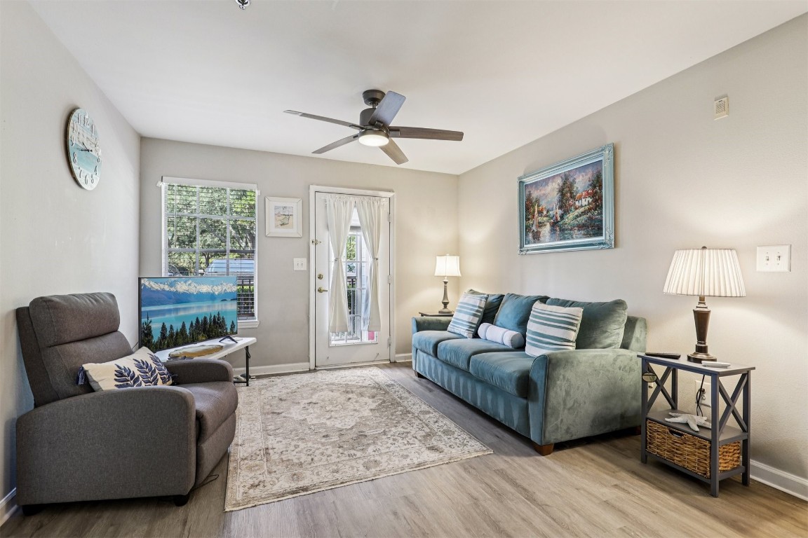 31183 Paradise Cmns, Unit 713 Fernandina Beach, FL 32034 - Photo 7 of 35 a living room with furniture and a window