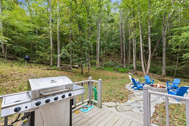 a view of a chairs and table in patio
