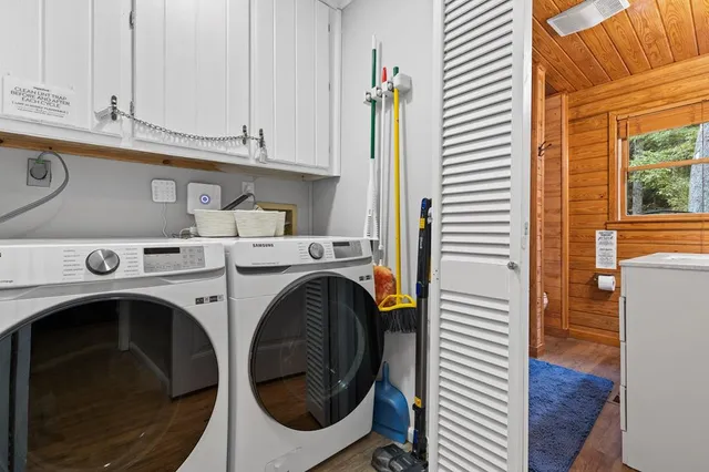 a utility room with dryer and washer