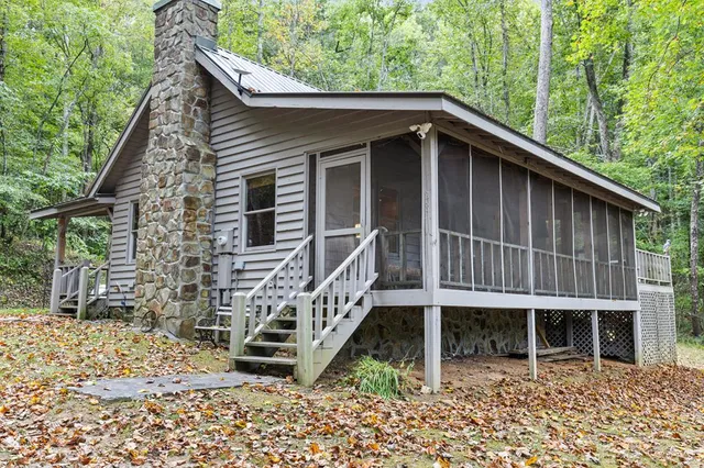 a backyard of a house with seating space