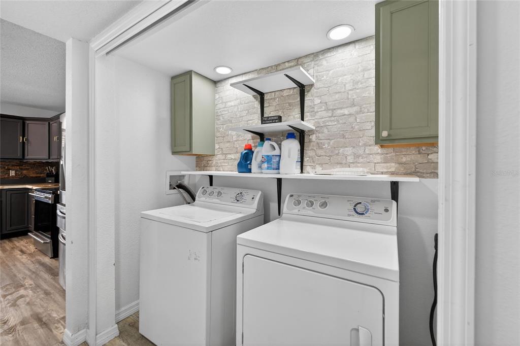 10325 Frog Pond Drive Riverview, FL 33569 - Photo 23 of 53 a utility room with dryer and washer