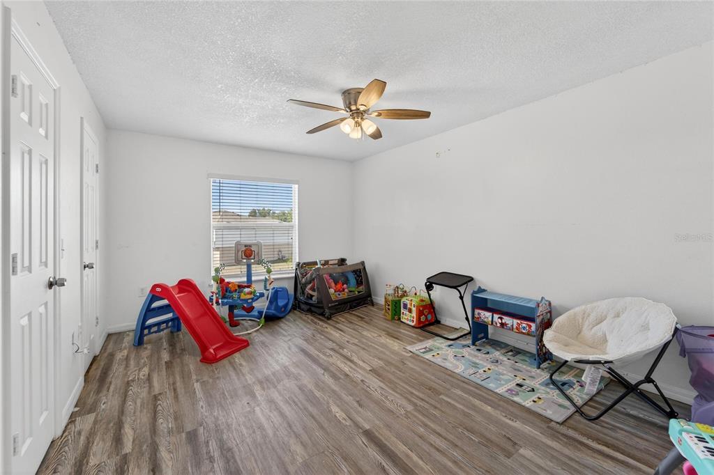 10325 Frog Pond Drive Riverview, FL 33569 - Photo 37 of 53 a living room with furniture