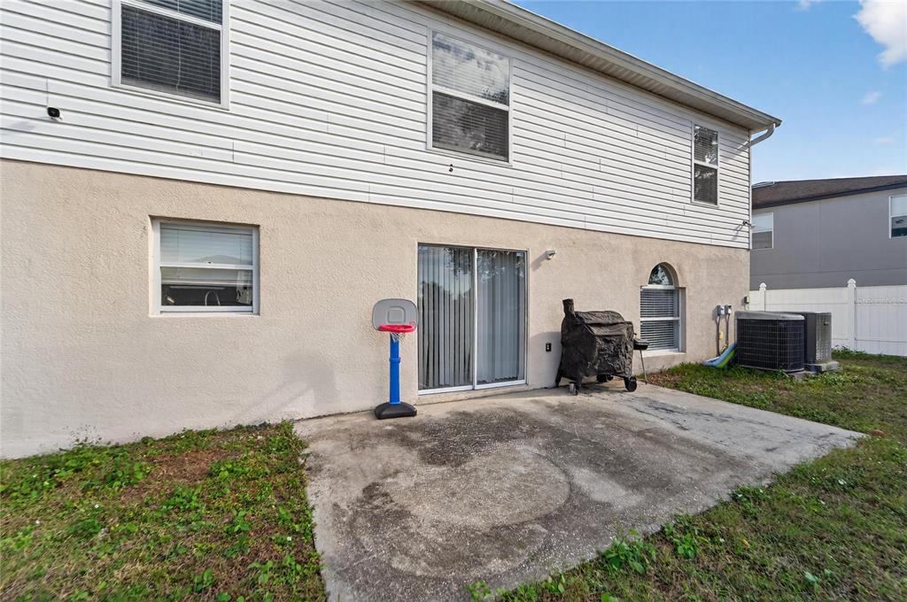 10325 Frog Pond Drive Riverview, FL 33569 - Photo 47 of 53 a front view of a house with a yard