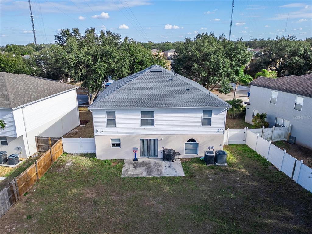 10325 Frog Pond Drive Riverview, FL 33569 - Photo 49 of 53 a view of a house with a yard and sitting area