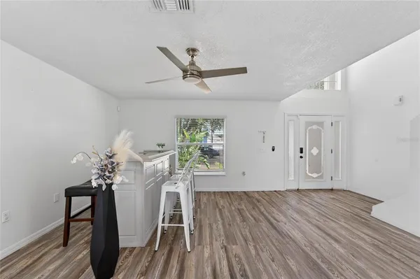 a view of a livingroom with wooden floor