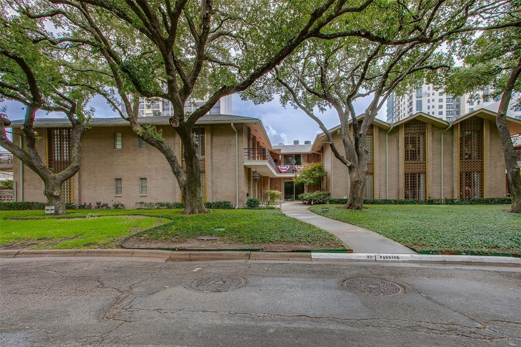 6314 Bandera Avenue, Unit C Dallas, TX 75225 - Photo 2 of 40 a front view of house with a garden and trees