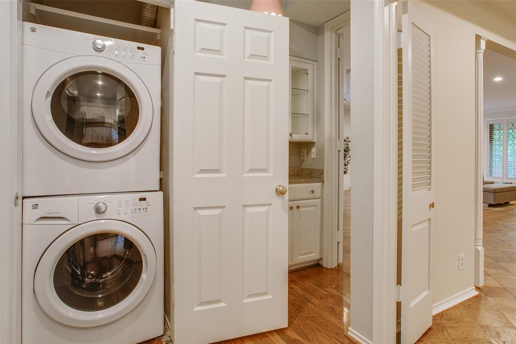 6314 Bandera Avenue, Unit C Dallas, TX 75225 - Photo 25 of 40 a view of a hallway with washer and dryer