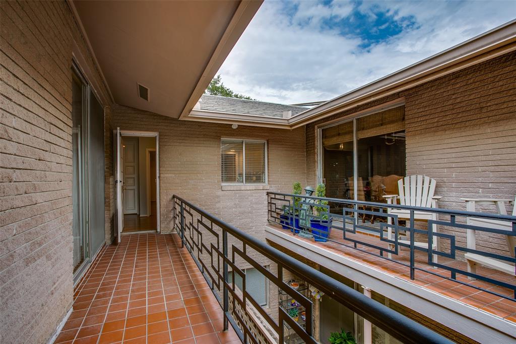 6314 Bandera Avenue, Unit C Dallas, TX 75225 - Photo 36 of 40 a view of balcony with wooden floor