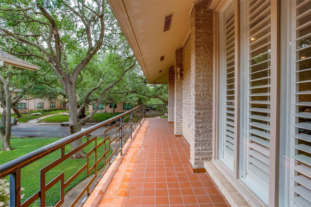 6314 Bandera Avenue, Unit C Dallas, TX 75225 - Photo 37 of 40 a view of balcony with wooden floor