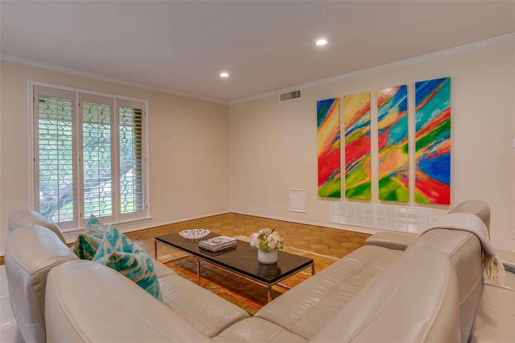 6314 Bandera Avenue, Unit C Dallas, TX 75225 - Photo 6 of 40 a room with furniture and a floor to ceiling window