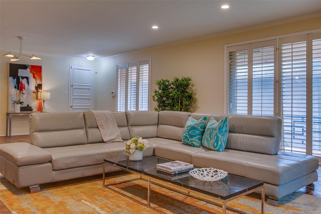 6314 Bandera Avenue, Unit C Dallas, TX 75225 - Photo 10 of 40 a living room with furniture and a large window