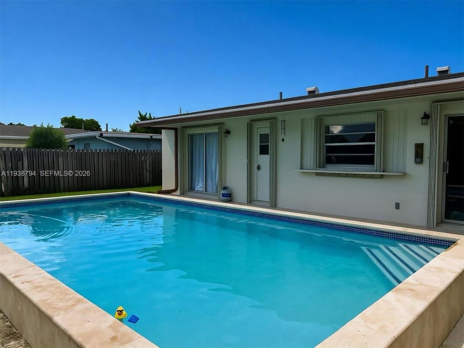 9955 Southwest 214th Street Cutler Bay, FL 33189 - Photo 11 of 15 a view of a backyard