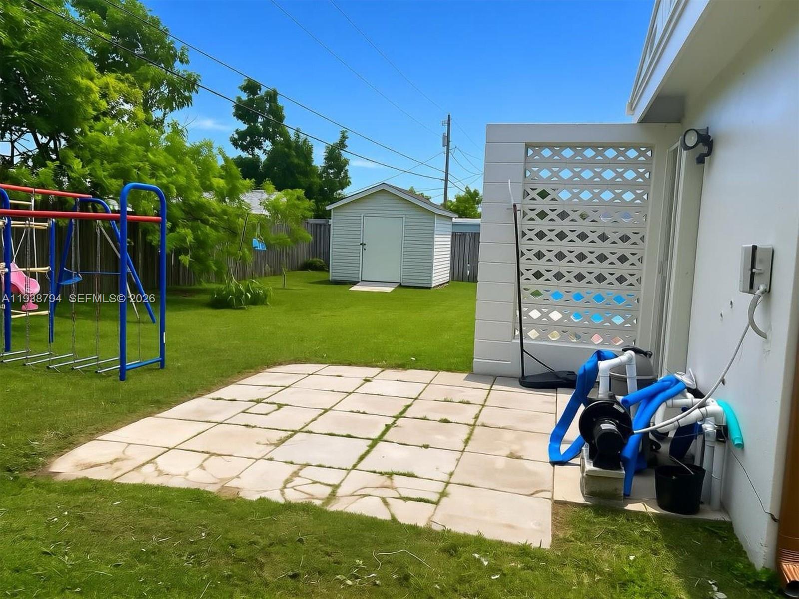 9955 Southwest 214th Street Cutler Bay, FL 33189 - Photo 15 of 15 a view of a back yard of the house